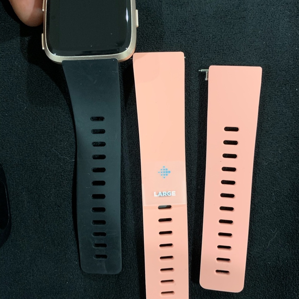 Rose gold Fitbit versa